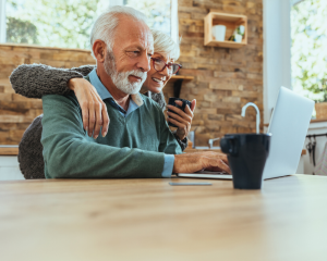 Senior Couple Looking at Computer Together